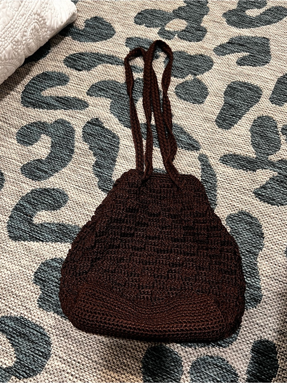 The Sak brown crochet bucket bag